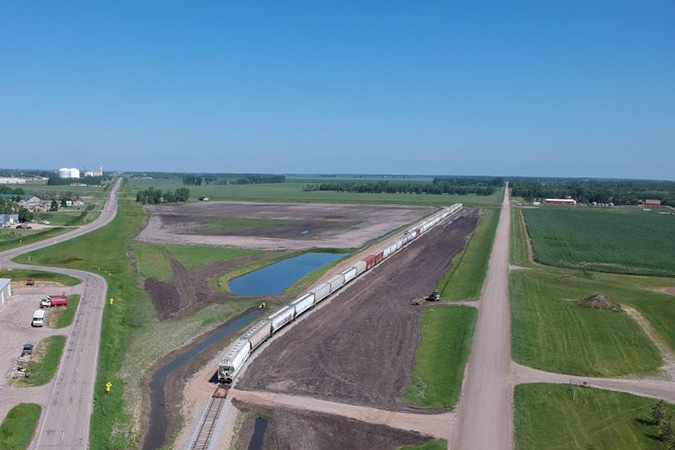Hopper cars near the mill in 2022. Photo by Trent Berg, Houston Engineering, Inc. Hopper cars near the mill in 2022. Photo by Trent Berg, Houston Engineering, Inc.